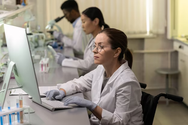 Doctors working in a computer lab